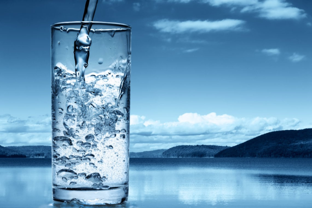 pouring glass of water ourdoors